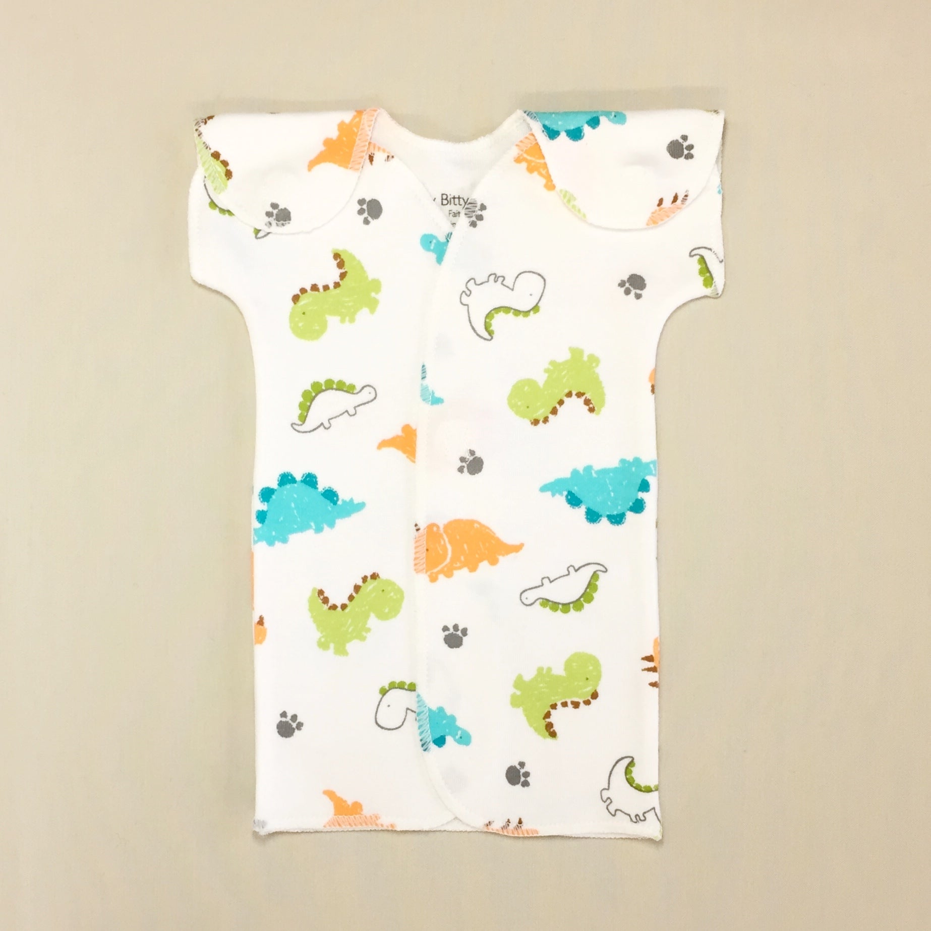 White NICU Baby Gown with Dinosaur Print and Velcro Shoulder Openings